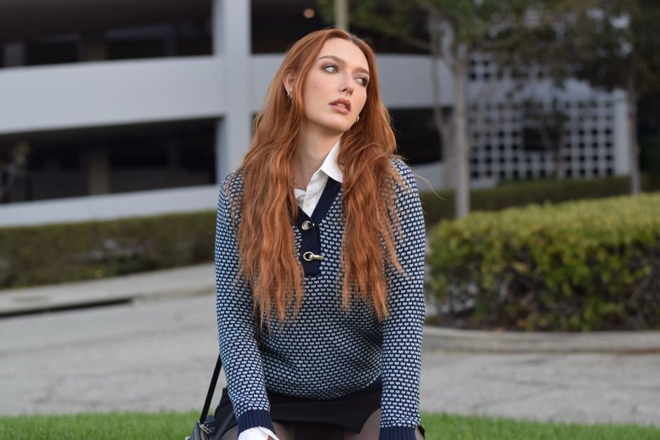 Accessories including pearl earrings, silk scarf, and handbag to complete preppy fall outfits