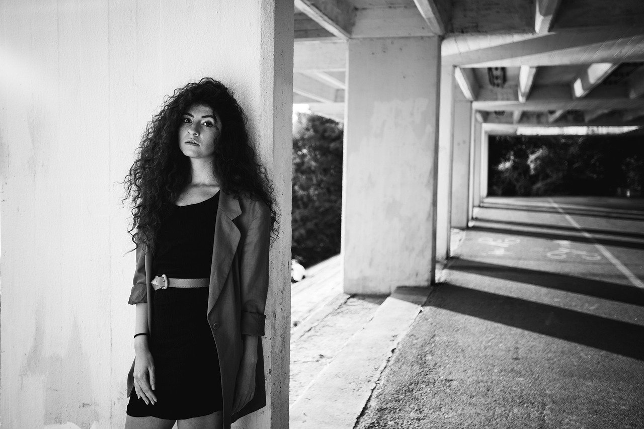 Collage of minimalist, bold, and romantic Black and White Fall Outfits styled for different fall fashion personalities