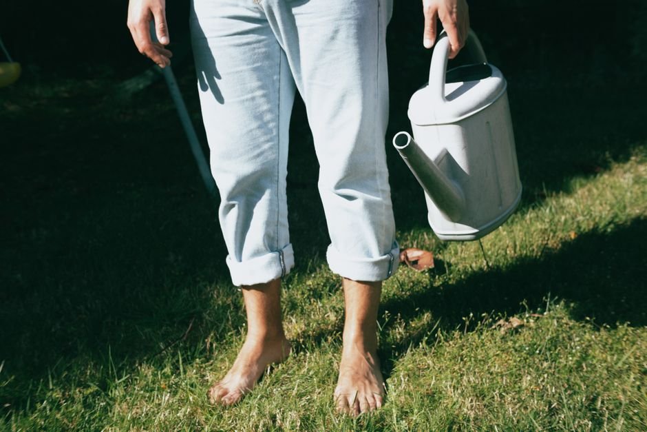 Lightweight summer jeans air drying outdoors to maintain fabric quality