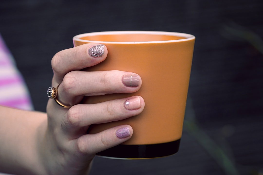 Brown Nails: 50+ Chic Designs to Try for 2025’s Top Trend 4 Comparison of brown nail shades from light caramel to dark espresso on different skin tones to show perfect nail color matching
