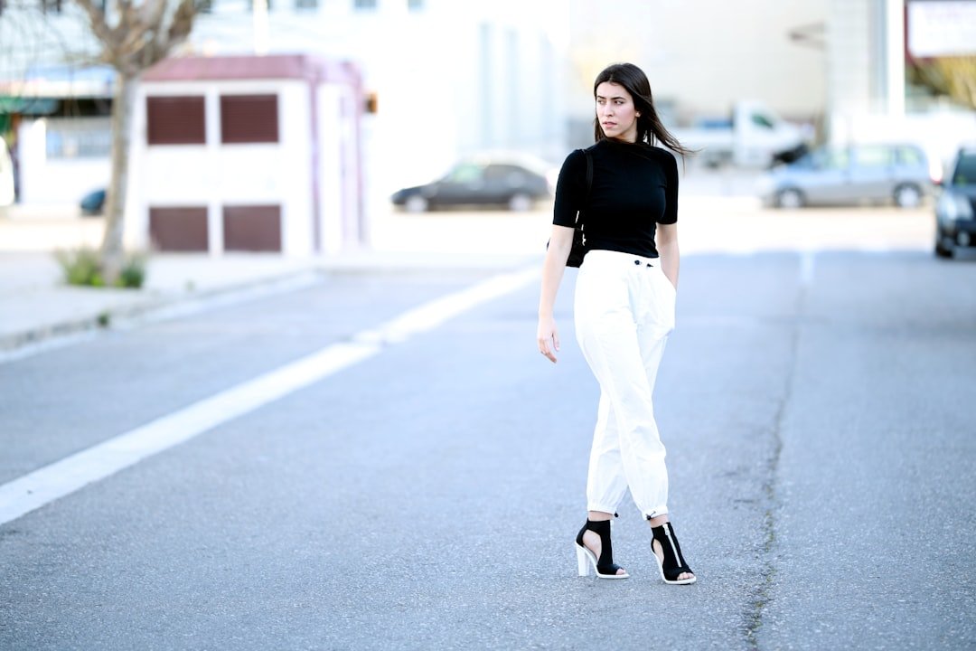 Classy Jeans Outfit Ideas: 30+ Sophisticated Ways to Style Denim for Any Occasion 3 Classy jeans outfit ideas for work with dark-wash denim, tailored blazer, silk blouse, and heels in a professional setting