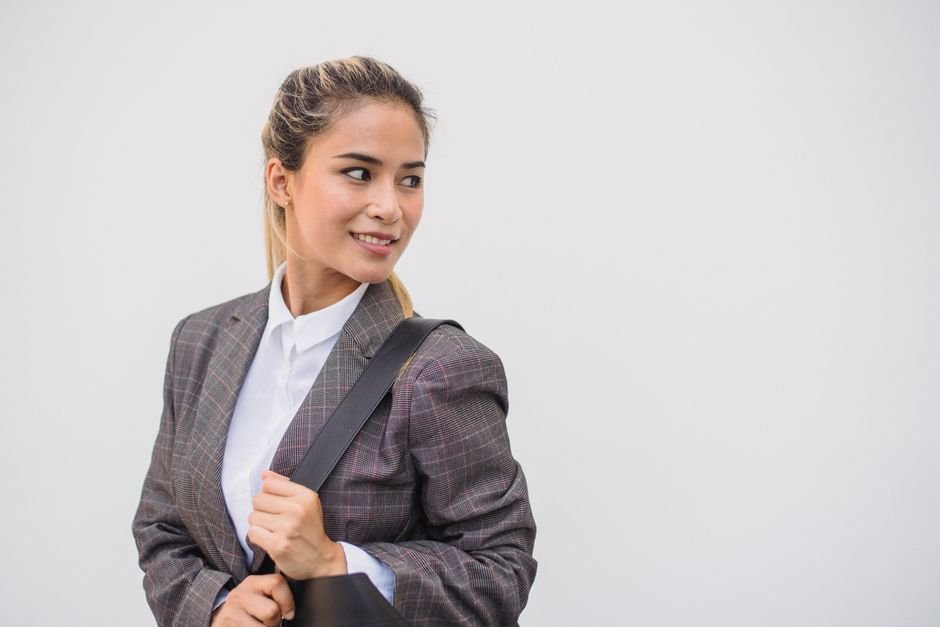 Professional blazer outfit with fitted black blazer, blouse, and trousers styled for modern workplaces.