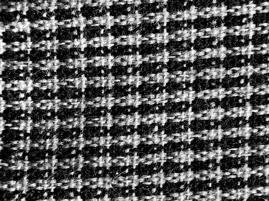 Tweed, corduroy, wool, and velvet fabrics representing the core materials of Dark Academia outfits.