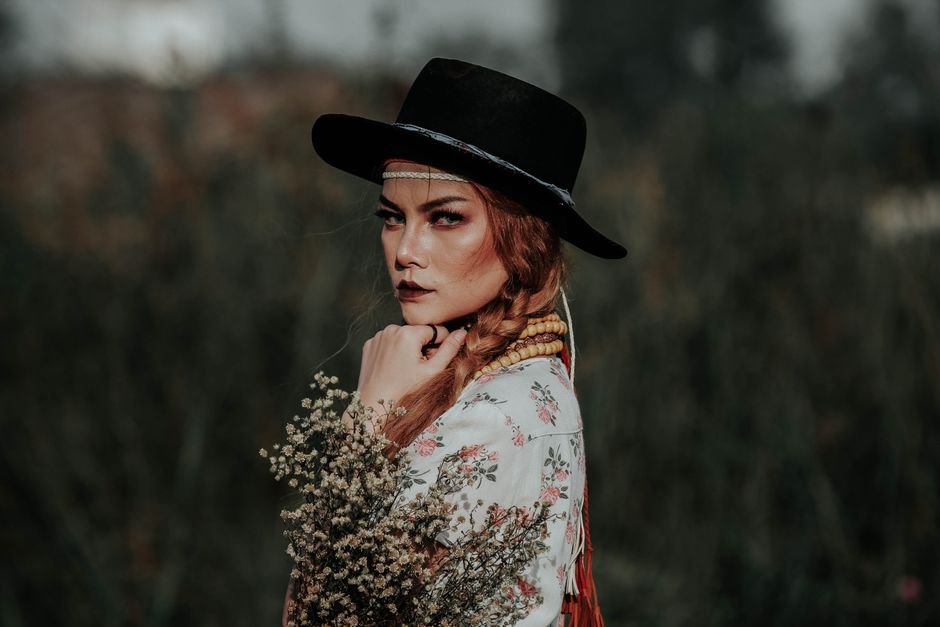 Summer Boho Outfits: 20 Effortless Bohemian Looks That Capture 2025's Free-Spirited Style 4 Boho hairstyle with beach waves, braids, and natural bronze makeup to match summer boho outfits.