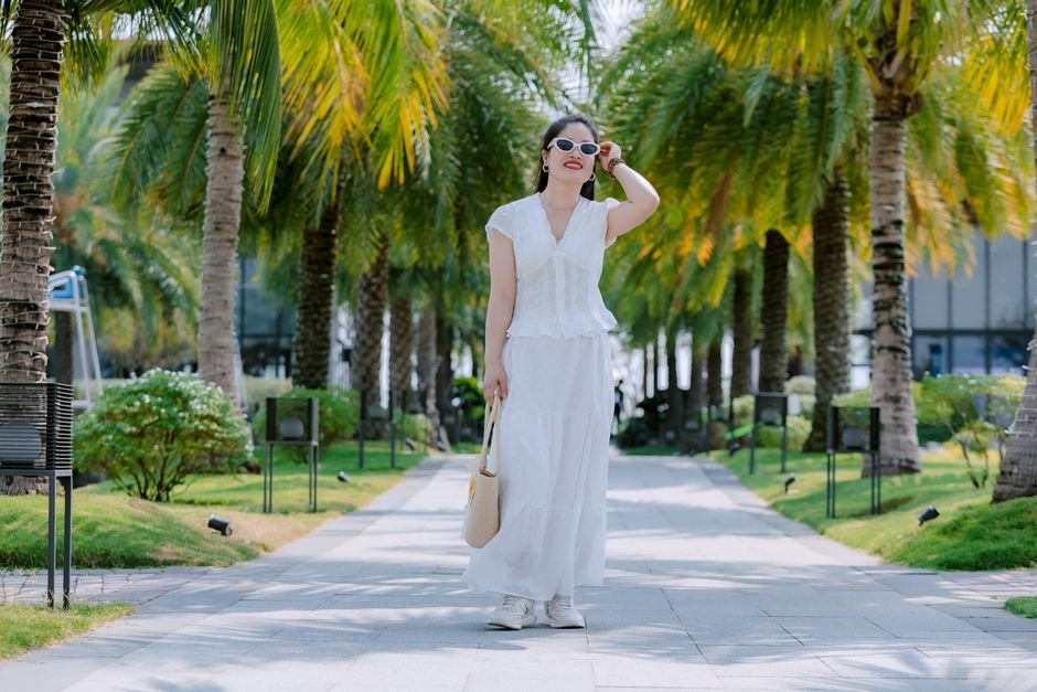 Lightweight blazer and midi skirt for professional Summer Chic Outfits in warm weather.