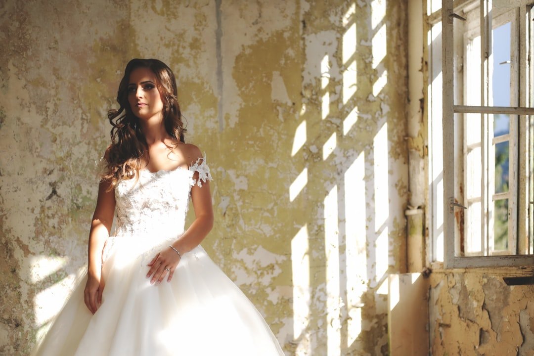 Plus size wedding dress with reinforced bust and waist support compared to standard bridal gown