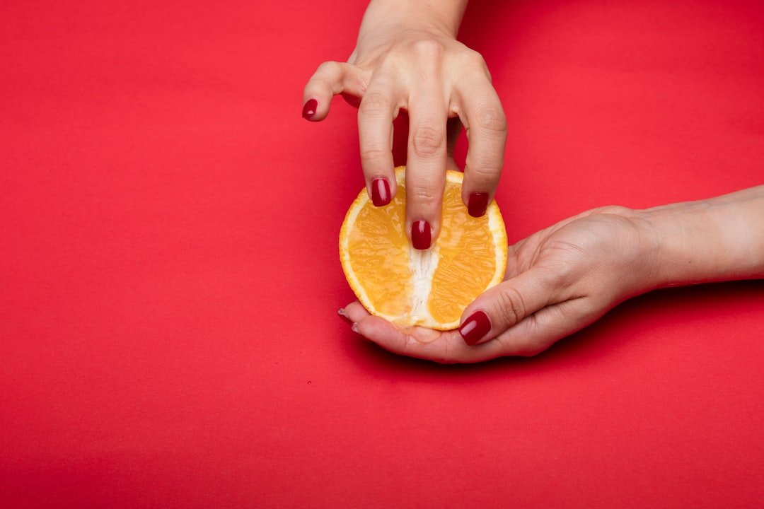 Orange French manicure variations including neon tips, ombré blends, and orange with gold accents
