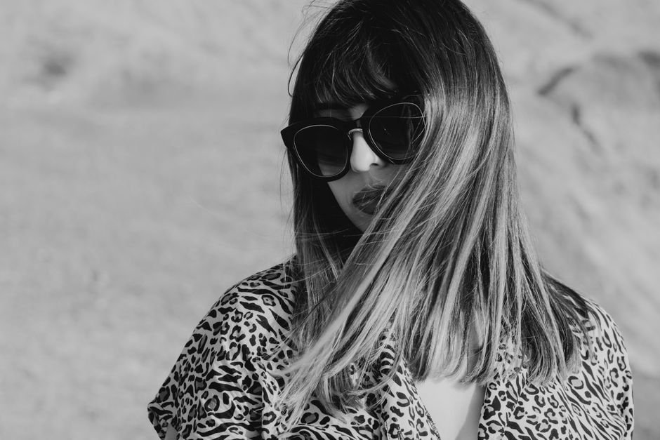 Step-by-step process showing how to create classic Summer Leopard Print Nails from base coat to finished look