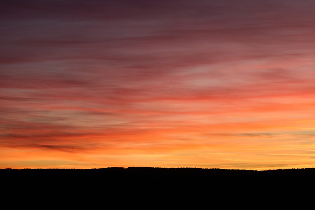Sunset Aura Reds Warmth With Movement