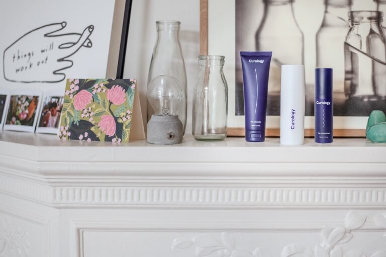 Woman following morning skincare routine for dry skin with moisturizer